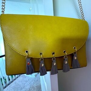Neiman marcus mustard purse with pin tassels